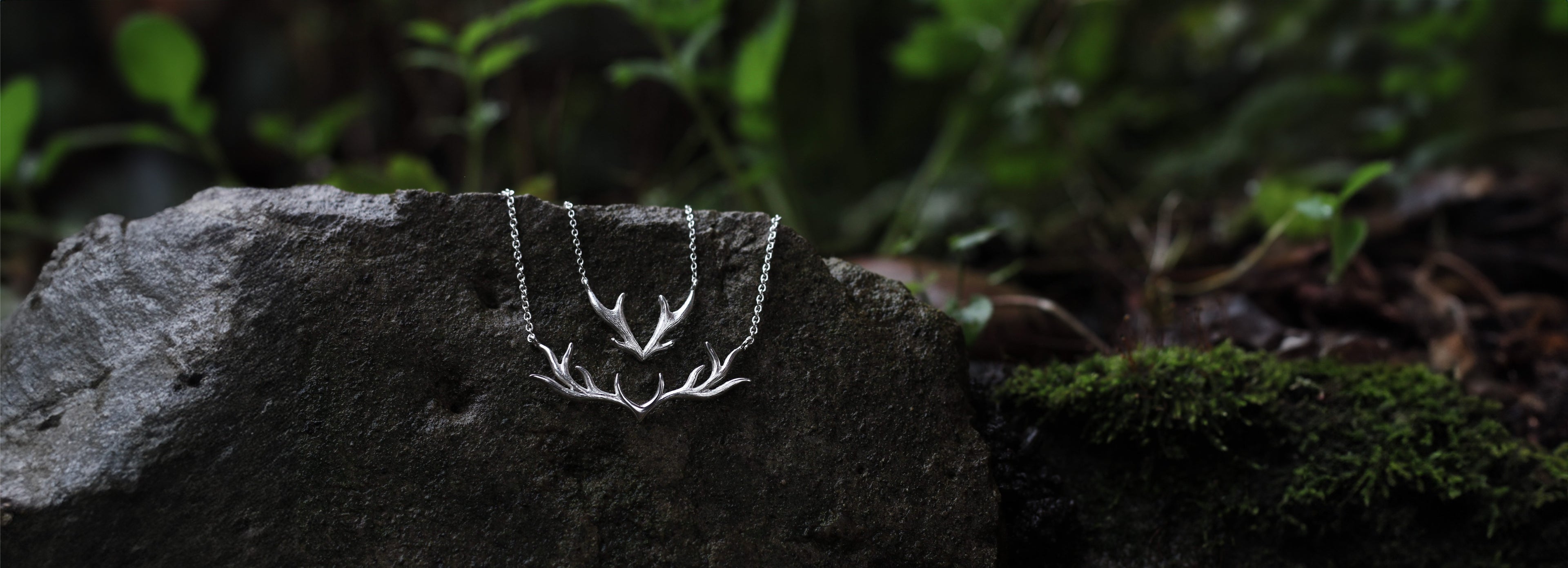 winter sale banner with two new antler necklaces