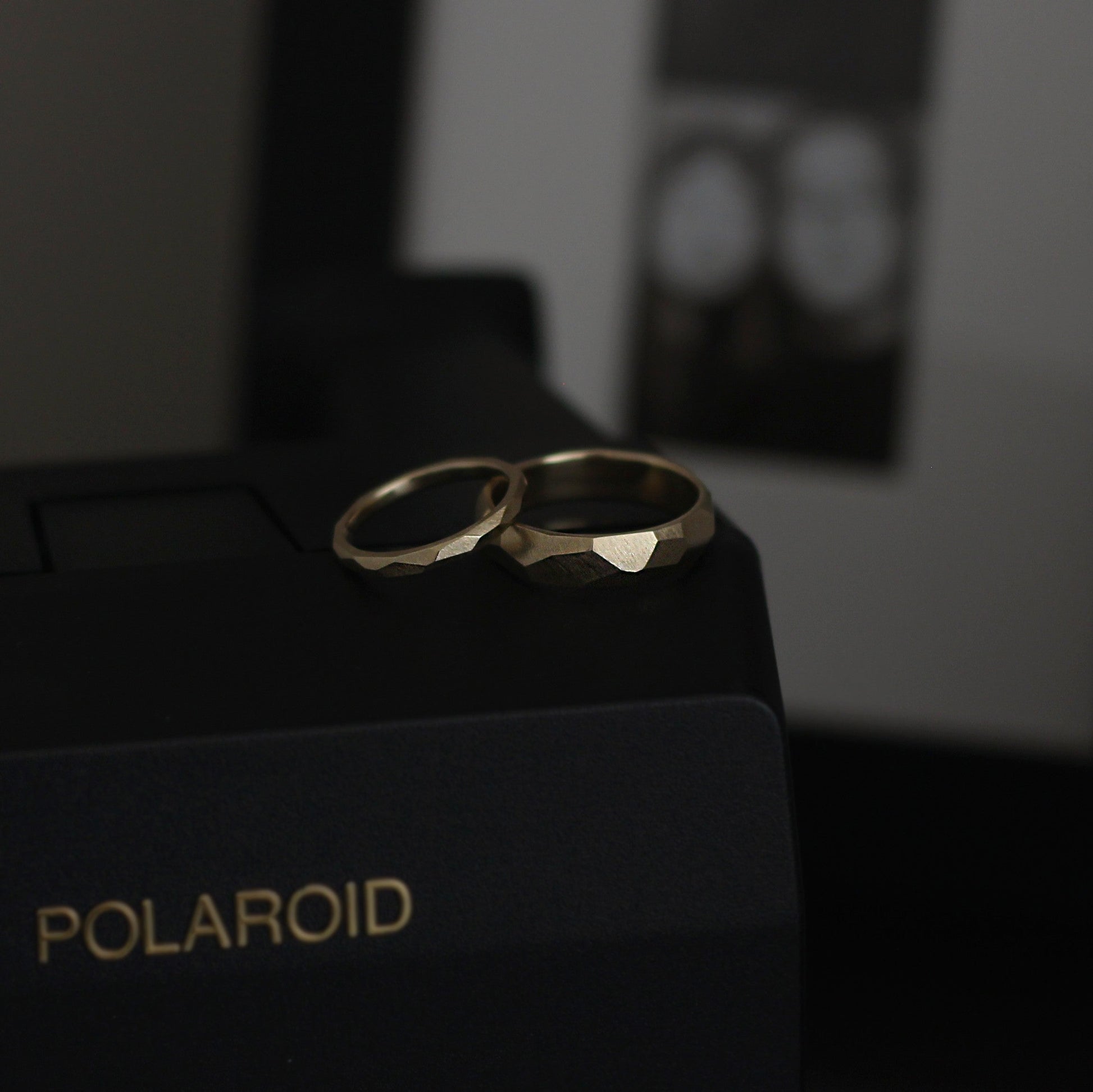 Geometric Faceted Ring - 9ct/18ct Gold, 2mm and 5mm width on a polaroid camera - Aisling Chou Studio