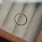 Moonlight Hammered Ring - 9ct / 18ct Gold on top of a jewellery box with glass window - Aisling Chou Studio